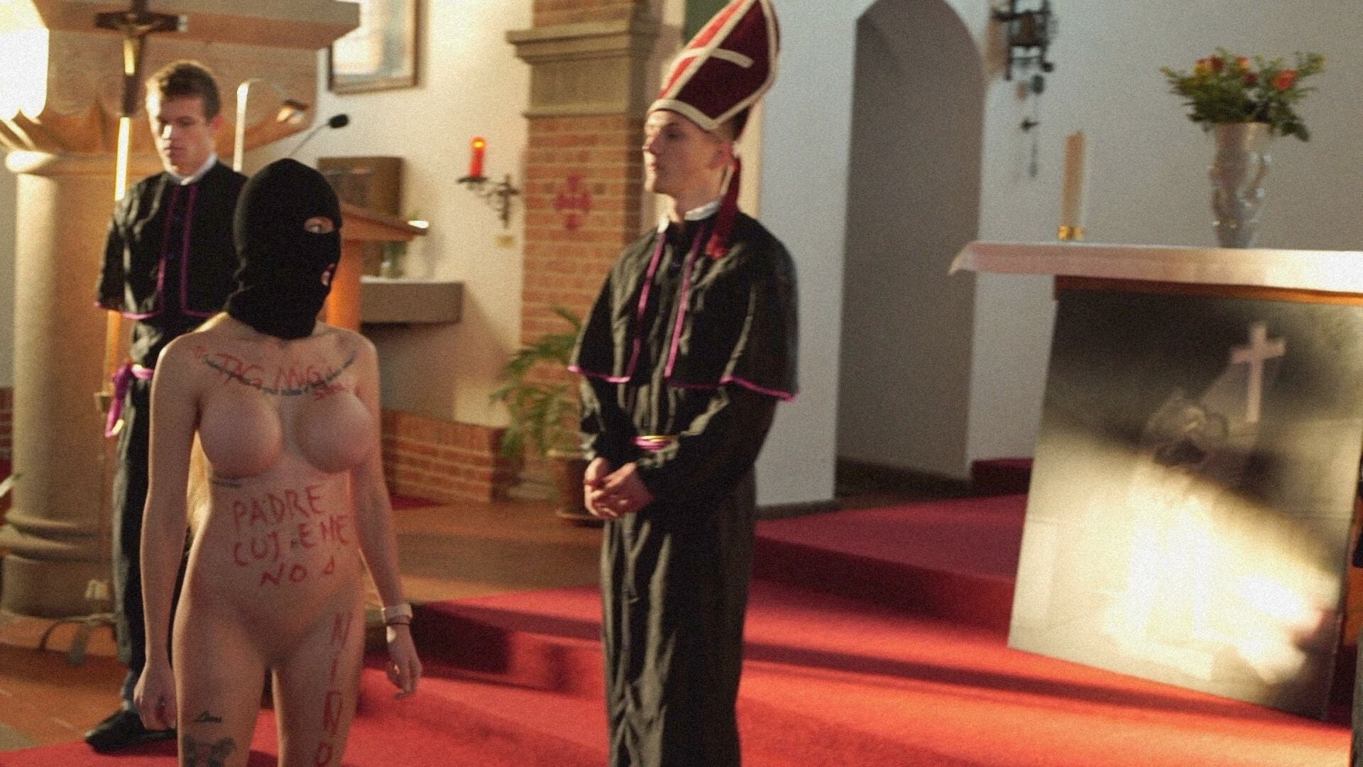 Artist Thomas Hanscomb doing guerilla marketing in a church